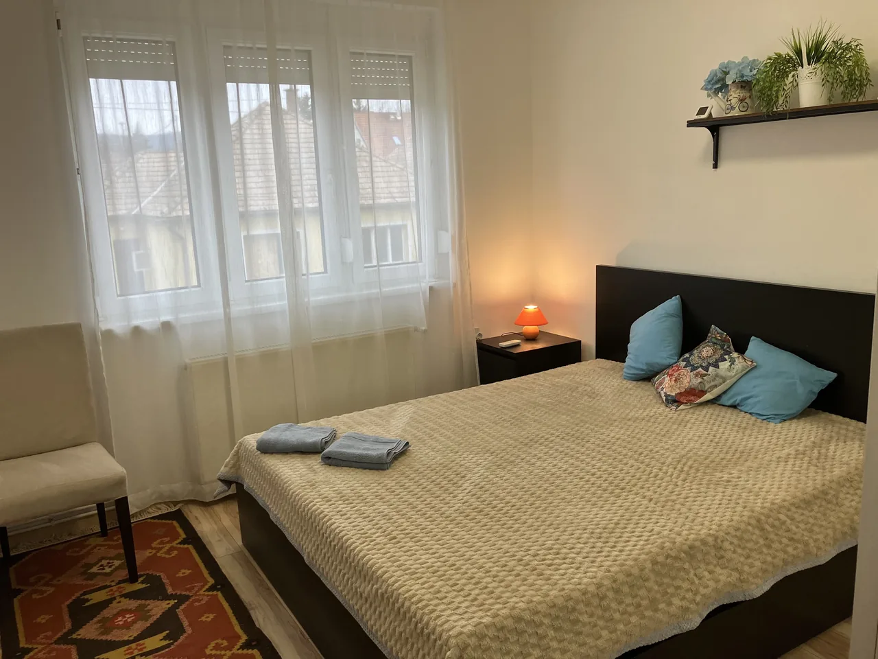 Bright bedroom with a double bed